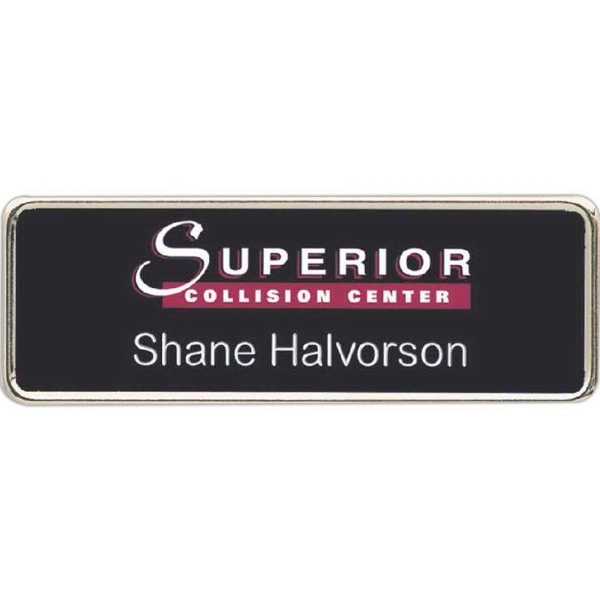 Badge with a metal frame and pin fastener.... from ASI 59080 Halls & Company