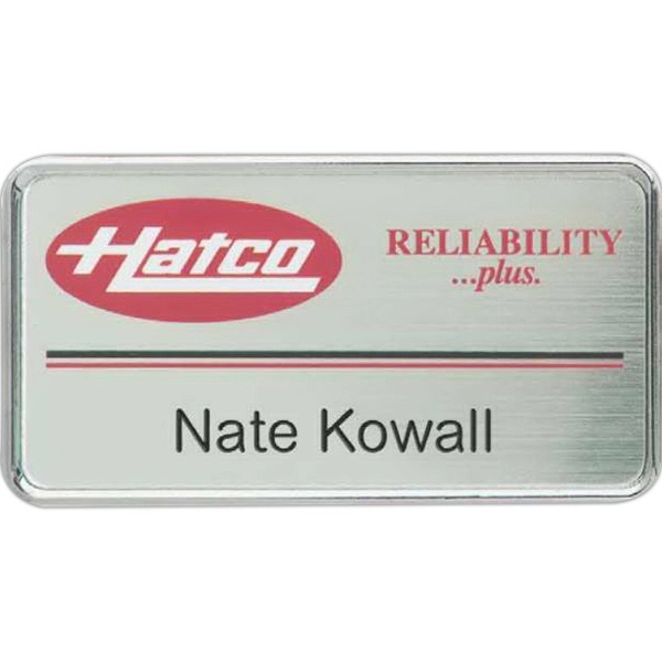 Badge with a metal frame and pin fastener.... from ASI 59080 Halls & Company