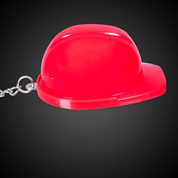Construction hat-shaped bottle opener keychain, made of plastic.... from ASI 42016 Brighter Promotions Inc