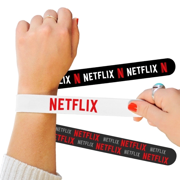 High-quality, food-grade silicone slap bracelet available in any PMS color or... from ASI 45657 Pop! Promos