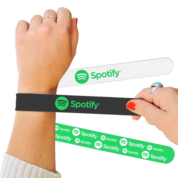 High-quality, food-grade silicone slap bracelet available in any PMS color or... from ASI 45657 Pop! Promos
