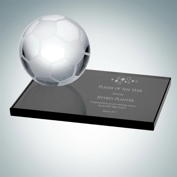 Optical crystal soccer ball award resting on a smoke glass base... from ASI 47791 Best Deal Awards / Best Deal Awards