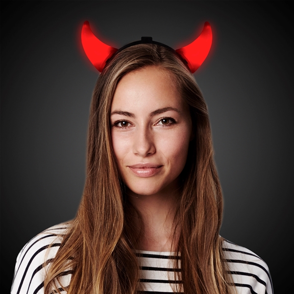 Plastic red devil horns with built-in LED lights mounted on a... from ASI 42016 Brighter Promotions Inc