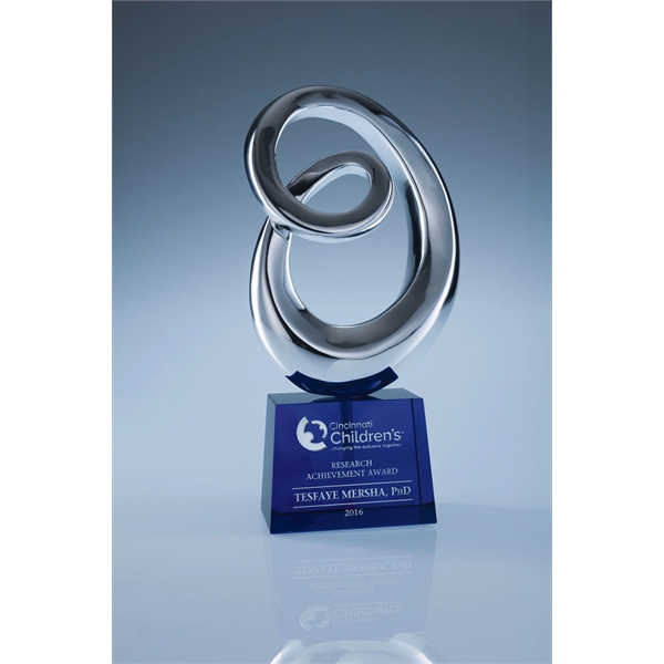 Infinia award made of chrome-plated resin with a base made of... from ASI 62985 J. Charles