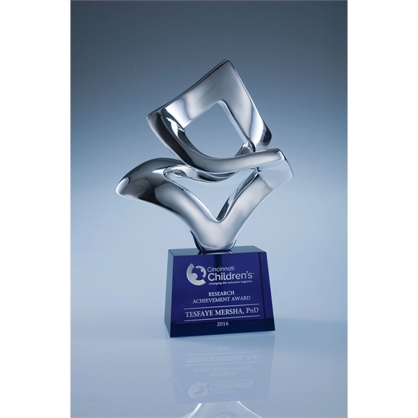 Performer award made of chrome-plated resin with a base made of... from ASI 62985 J. Charles
