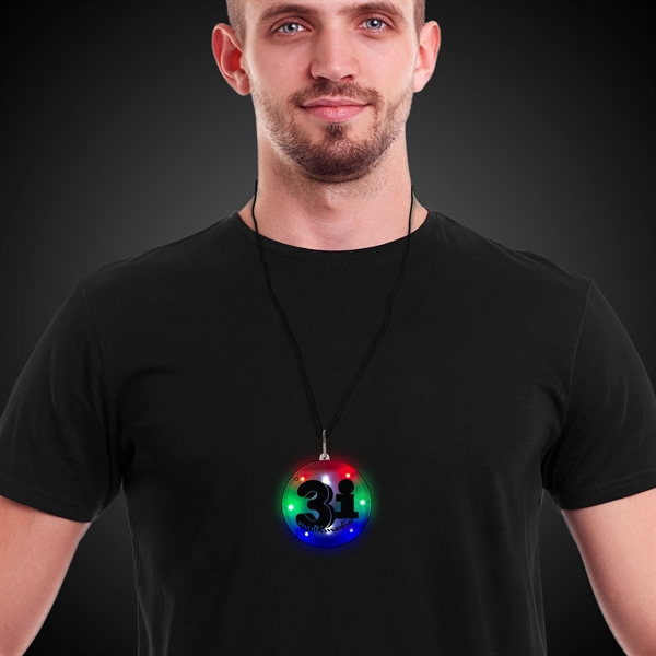 Multi-colored LED disc pendant with different light functions... from ASI 42016 Brighter Promotions Inc