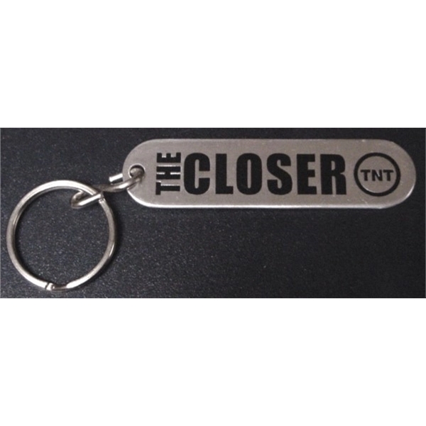 3" x 3/4" oblong shaped key fob. 4 different imprinting styles... from ASI 41080 Nelson Boone Co Inc / Alumaline® & Brass