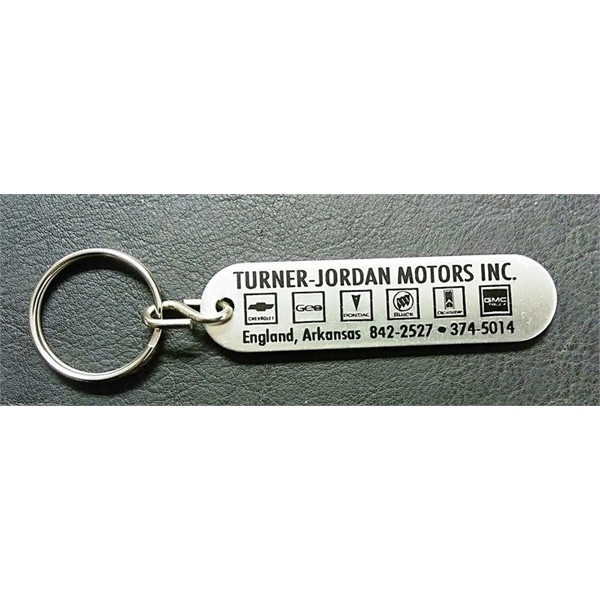 3" x 3/4" oblong shaped key fob. 4 different imprinting styles... from ASI 41080 Nelson Boone Co Inc / Alumaline® & Brass