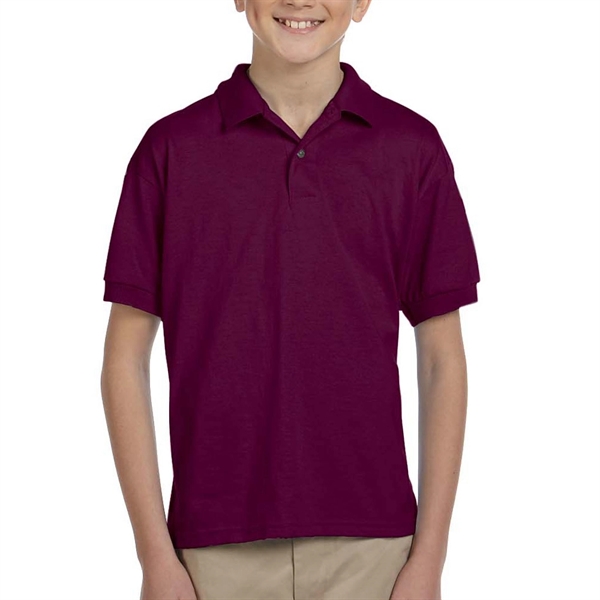 Gildan moisture-wicking cotton / polyester youth polo with two wood-tone button... from ASI 39552 BEL Promo