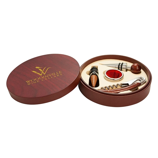 Corkscrew, bottle stopper, drip ring and a wine pourer boxed in... from ASI 30112 ACE Products / Ace Line