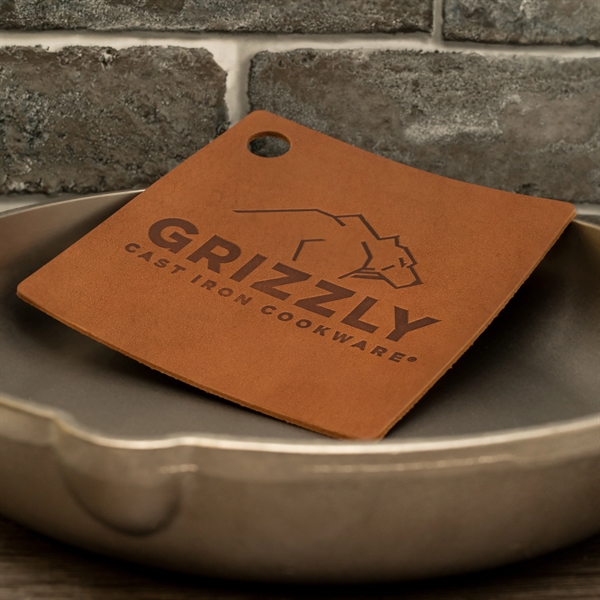 Genuine leather potholder or trivet will make your dinner guest envious.... from ASI 75126 Oowee Products