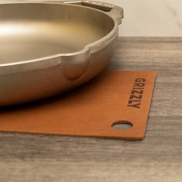 Genuine leather potholder or trivet will make your dinner guest envious.... from ASI 75126 Oowee Products