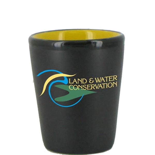1.5 oz. ceramic shot glass with a yellow interior and black... from ASI 46573 Cooper & Clement Inc