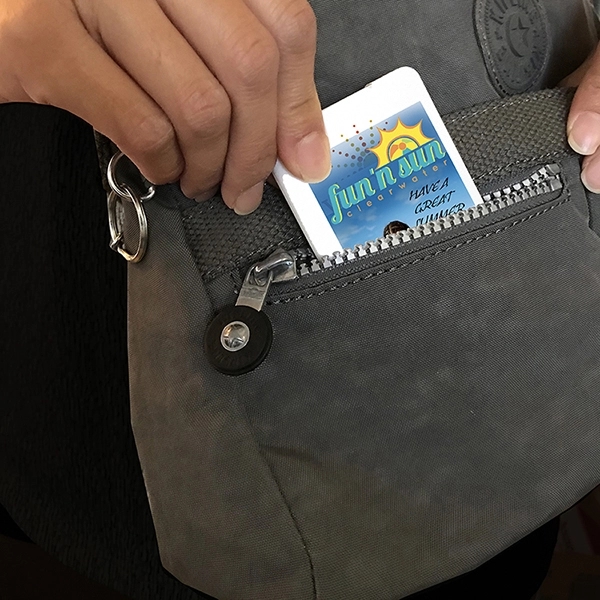 Solid white credit card shaped bottle with SPF30 vanilla sunscreen spray.... from ASI 62660 Innovation Line