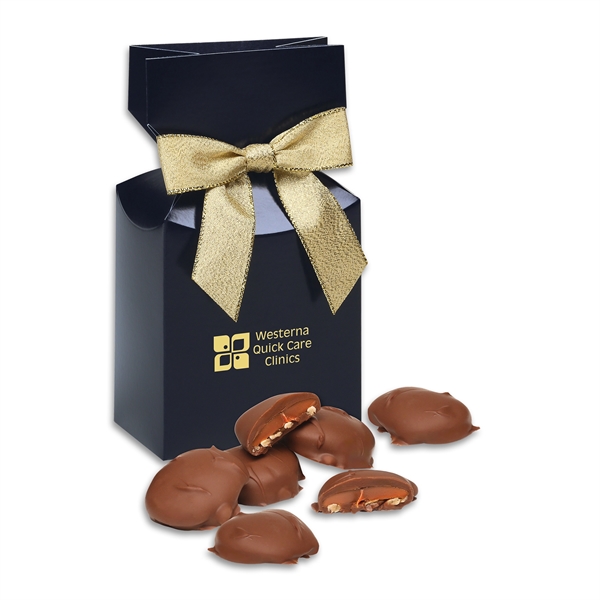 Navy gift box filled with pecan turtles.... from ASI 68680 Maple Ridge Farms Inc