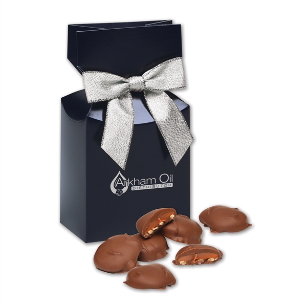 Navy gift box filled with pecan turtles.... from ASI 68680 Maple Ridge Farms Inc