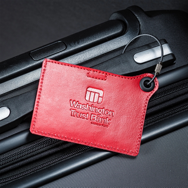 Luggage tag made of red leather with a metal strap and... from ASI 48125 Dacasso / DaCasso