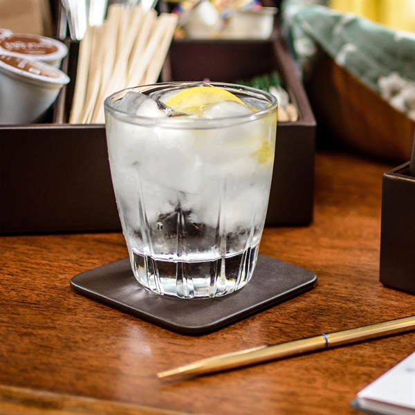 Square coaster made of leatherette material in a chocolate brown color.... from ASI 48125 Dacasso / DaCasso