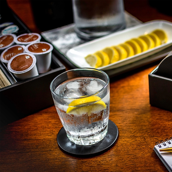 Black coaster made of leatherette material with a thin metal core.... from ASI 48125 Dacasso / DaCasso