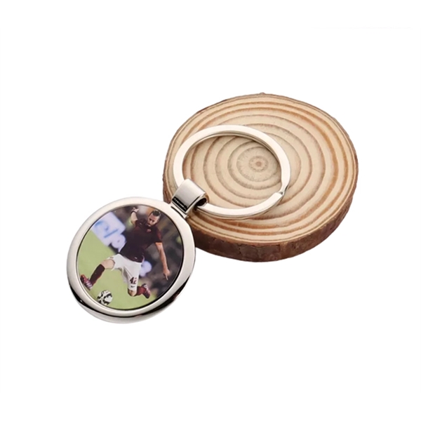 Round metal keychain with heat transfer imprint and standard delivery to... from ASI 37218 Athena Promo (tm)