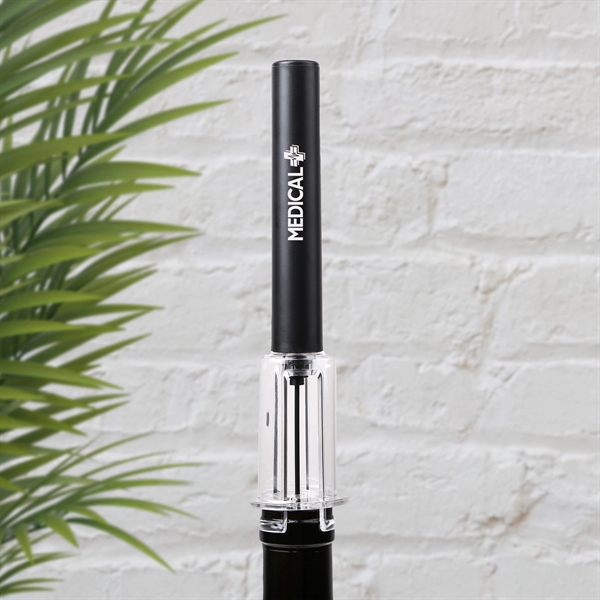 An air pressure pump wine bottle opener creates a suction/pressure causing... from ASI 61966 HPG / Beacon Promotions