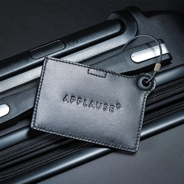 Luggage tag made of black leather with a metal strap and... from ASI 48125 Dacasso / DaCasso