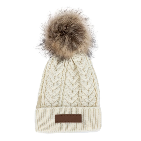 A cozy cable-knit winter hat with a faux fur pom and... from ASI 30250 AZX Sport USA