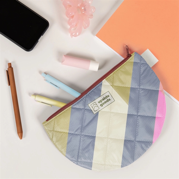 The Slice Pouch is a flat, half-moon shaped canvas pouch with... from ASI 74710 Numo