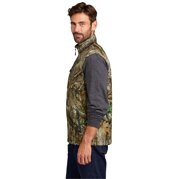 Russell Outdoors Realtree Atlas Soft Shell Vest... from ASI 84863 SanMar