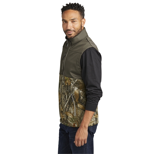 Russell Outdoors Realtree Atlas Colorblock Soft Shell Vest... from ASI 84863 SanMar