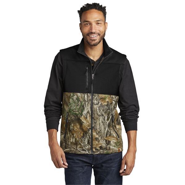 Russell Outdoors Realtree Atlas Colorblock Soft Shell Vest... from ASI 84863 SanMar