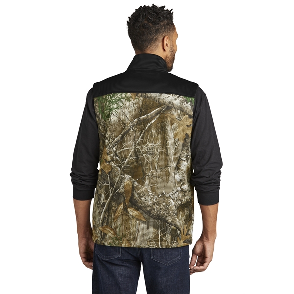 Russell Outdoors Realtree Atlas Colorblock Soft Shell Vest... from ASI 84863 SanMar