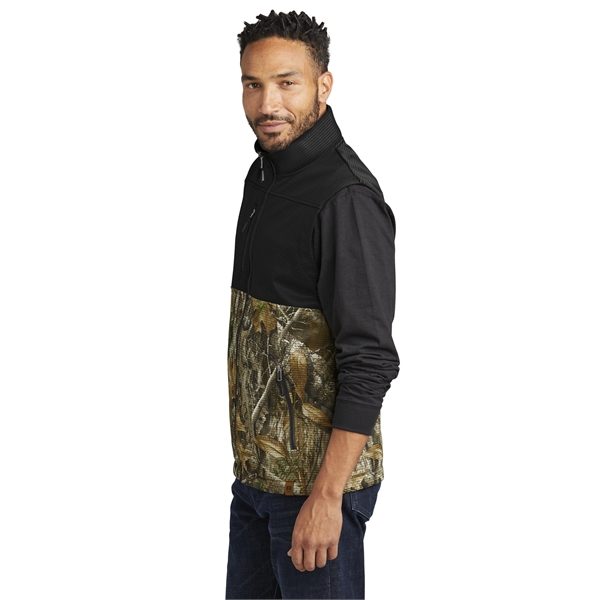 Russell Outdoors Realtree Atlas Colorblock Soft Shell Vest... from ASI 84863 SanMar