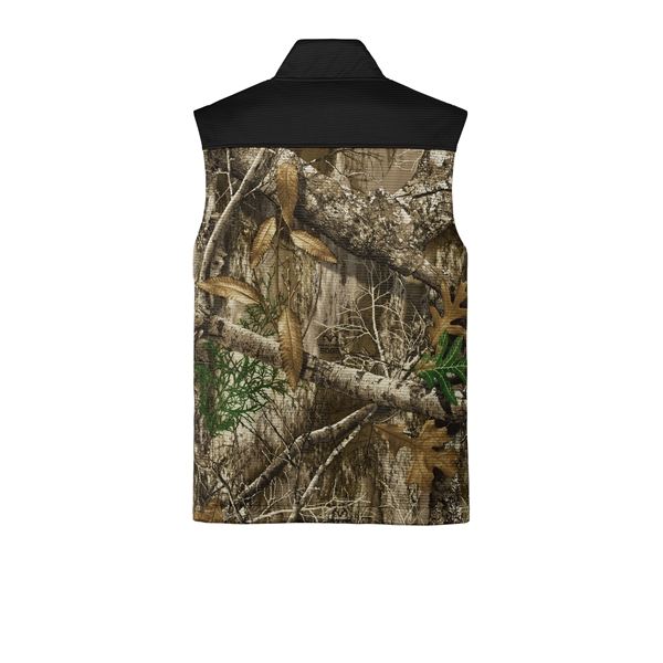 Russell Outdoors Realtree Atlas Colorblock Soft Shell Vest... from ASI 84863 SanMar
