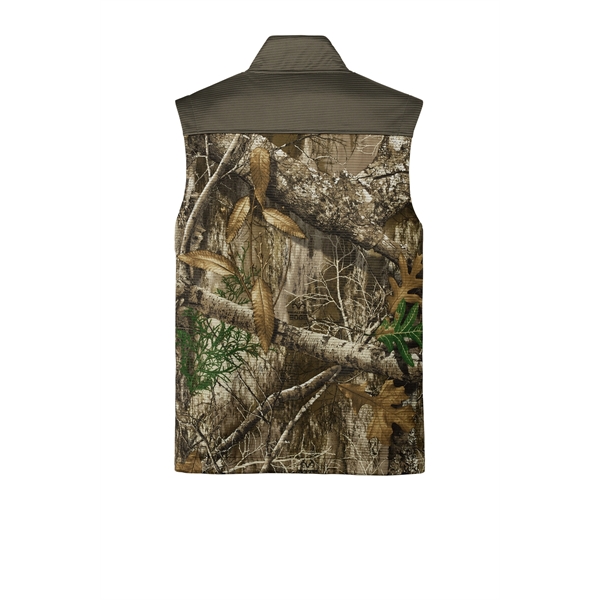 Russell Outdoors Realtree Atlas Colorblock Soft Shell Vest... from ASI 84863 SanMar