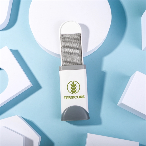 Double sided travel sized lint remover with self cleaning base. Double... from ASI 61966 HPG / Mixie