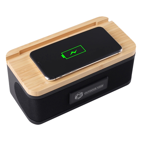 Sleek wireless bamboo speaker and charger... from ASI 61966 HPG / OrigAudio