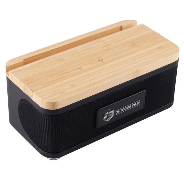 Sleek wireless bamboo speaker and charger... from ASI 61966 HPG / OrigAudio
