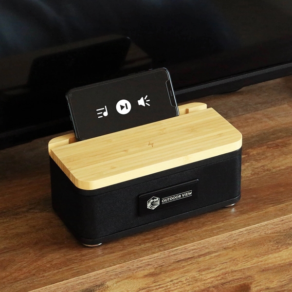 Sleek wireless bamboo speaker and charger... from ASI 61966 HPG / OrigAudio