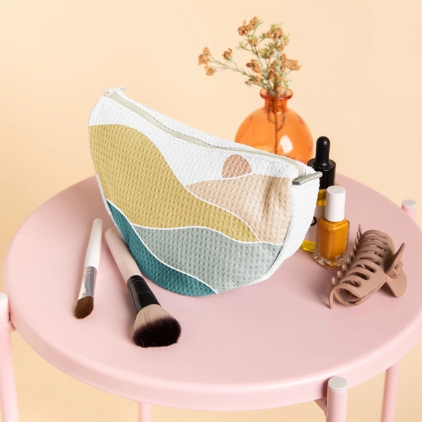 The Wedge is a half-moon shaped, gusseted pouch with a zippered... from ASI 74710 Numo