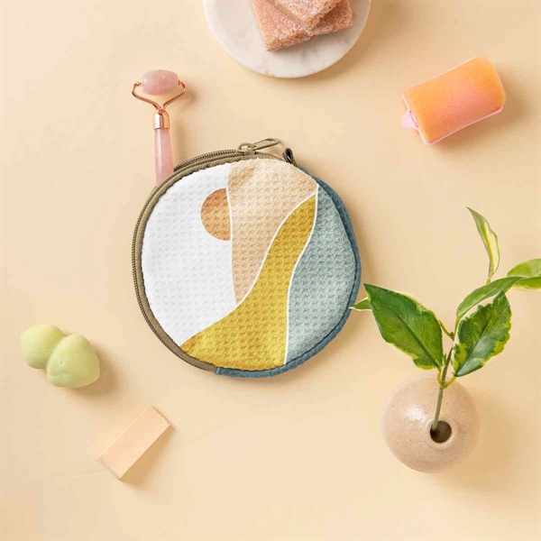 The Pancake Pouch is a circular, flat pouch small enough to... from ASI 74710 Numo