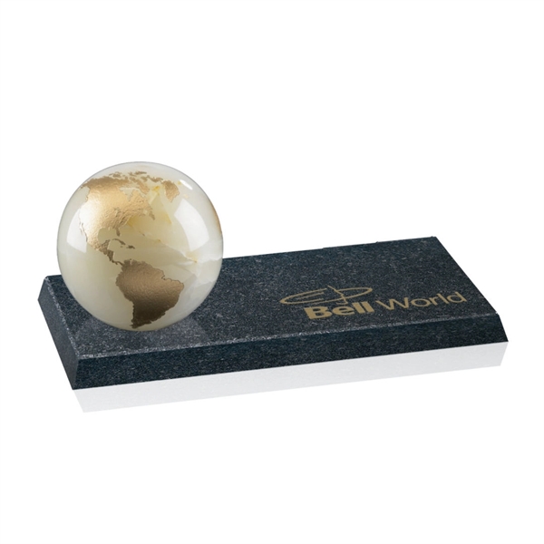 A White Marble Globe, with the continents color-filled in gold, on... from ASI 84592 St Regis Group