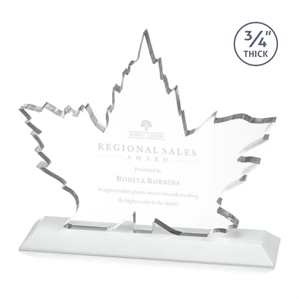 Stunning Starfire Crystal formed into a beautiful maple leaf mounted on... from ASI 84592 St Regis Group / St Regis