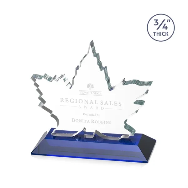 Stunning Starfire Crystal formed into a beautiful maple leaf mounted on... from ASI 84592 St Regis Group / St Regis