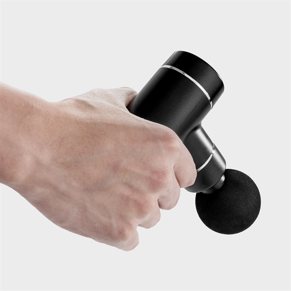 A luxurious electronic massage gun with an assortment of attachments packed... from ASI 91435 Tomax USA / Tomax