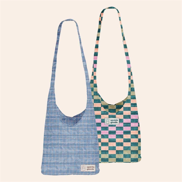 A crossbody, hobo-style tote, this bag fits snugly against your person... from ASI 74710 Numo