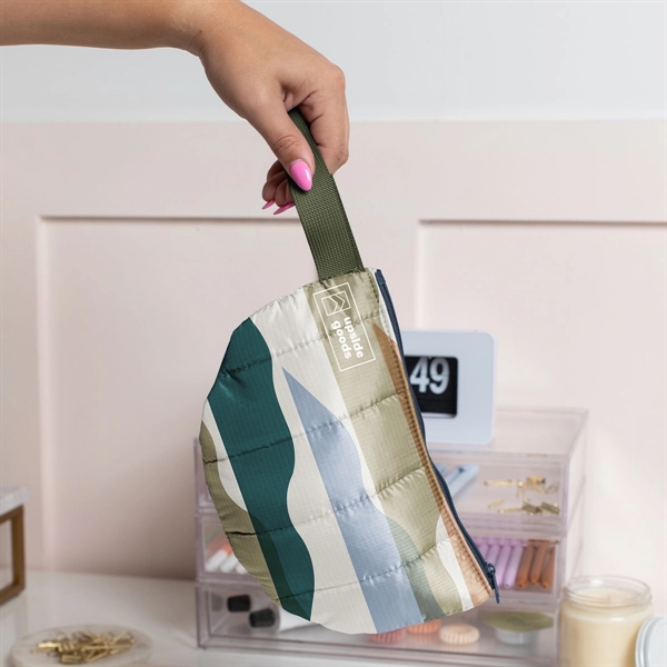 The Slice To Go is a spacious half-moon pouch with a... from ASI 74710 Numo