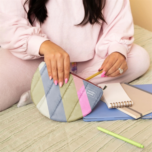 The Slice Pouch is a flat, half-moon shaped canvas pouch with... from ASI 74710 Numo