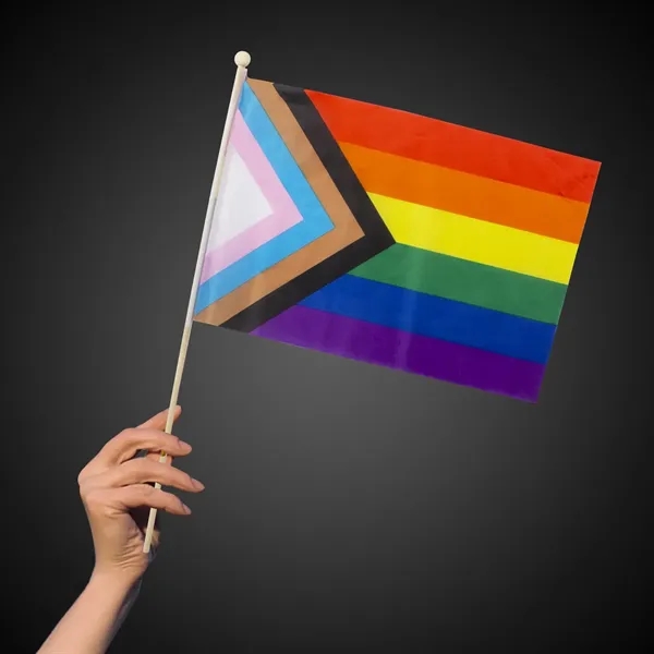 12" x 18" plastic rainbow flag with 23" wooden stick.... from ASI 42016 Brighter Promotions Inc