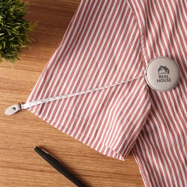 A vegan leather 5" tape measure featuring a dual-sided 60" tape... from ASI 61966 HPG / Beacon Promotions